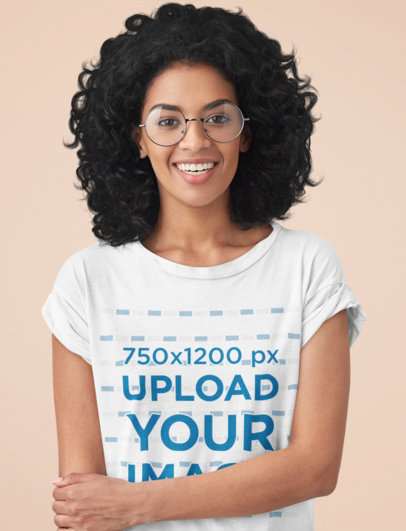T-Shirt Mockup of a Curly-Haired Woman in a Studio