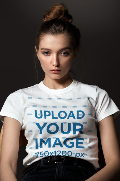 T-Shirt Mockup of a Serious-Looking Woman with a Dark Background 39373-r-el2