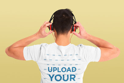 Back View Mockup of a Man Wearing a T-Shirt and Listening to Music at a Studio 42688-r-el2