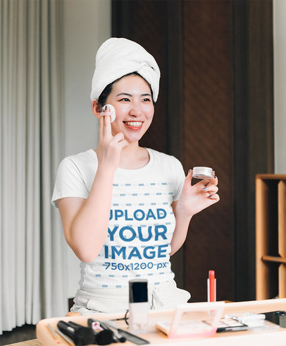 T-Shirt Mockup of a Happy Woman Doing Her Makeup