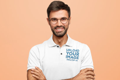 Polo Shirt Mockup of a Smiling Bearded Man Posing at a Studio