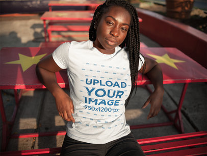Young Woman with Locs Wearing a T-Shirt Mockup While Against a Red Table