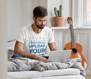 T-Shirt Mockup of a Music Producer Working from Home