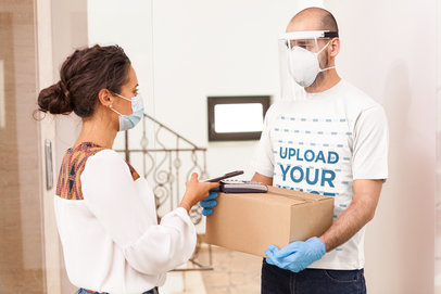 T-Shirt Mockup Featuring a Delivery Man Holding a Box 39566-r-el2