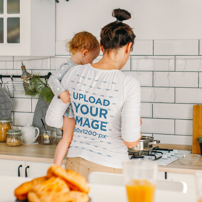 Long Sleeve Tee Mockup of a Mom Cooking While Holding Her Baby