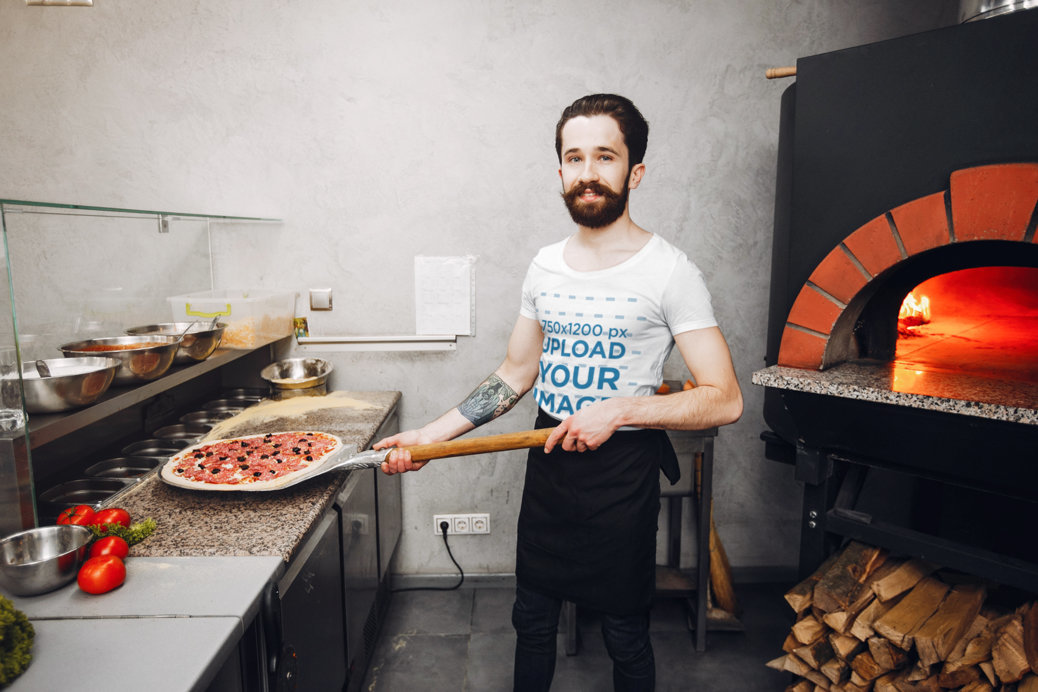 T-Shirt Mockup of a Happy Man Making a Pizza 