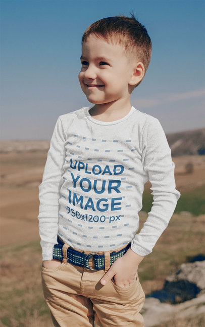 Long Sleeve Tee Mockup of a Little Kid with a Playful Smile