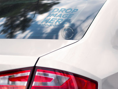 Square Decal Mockup on the Back Window of a White Car while Reflecting the Sky