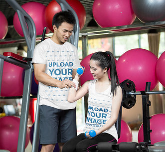 Tank Top and T-Shirt Mockup of a Woman and Her Personal Trainer 