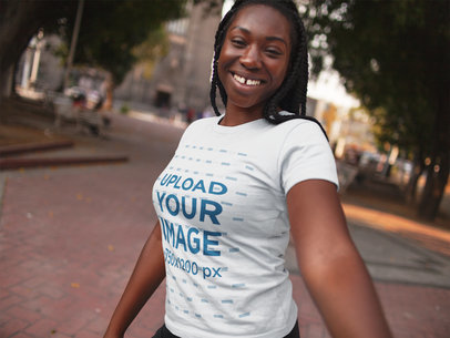 Smiling Black Girl with Dreadlocks Wearing a Tshirt Template While Taking a Walk a15955