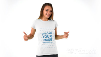 Video of a Young Woman Posing with a T-Shirt in a Studio