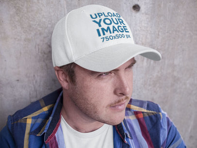 Man Looking to the Horizon While Wearing a Dad Hat Mockup