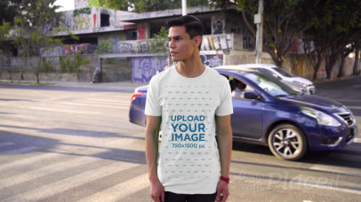 Video of a Young Man Wearing a T-Shirt in an Urban Scenario