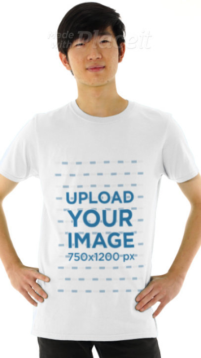 Basic T-Shirt Video of a Young Man Posing Against a Plain Background 