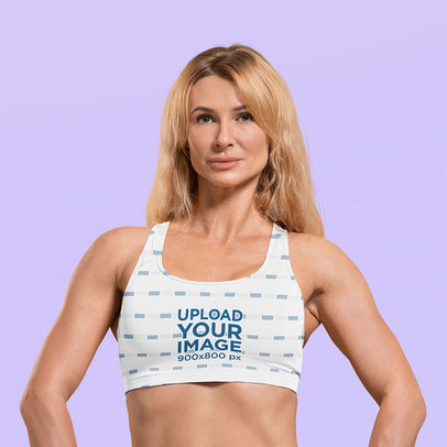 Sublimated Sports Bra Mockup of a Serious Woman at a Studio