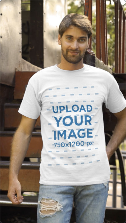 T-Shirt Video of a Man Posing by an Abandoned Train