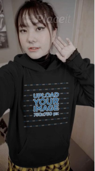Hoodie Video of a Young Woman Taking a Selfie 4479v