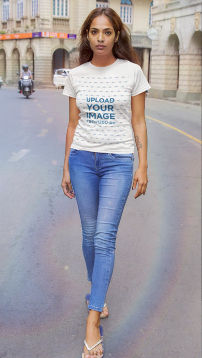 T-Shirt Video Featuring a Serious Woman Posing in the Street