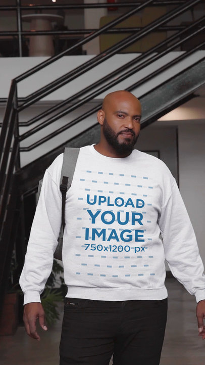 Video of a Bearded Man Wearing a Crewneck Sweatshirt at an Office