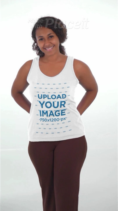 Tank Top Video Featuring a Woman With an Afro Hairstyle Posing at a Studio 