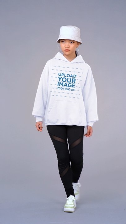 Pullover Hoodie Video Featuring a Woman With Activewear Clothes