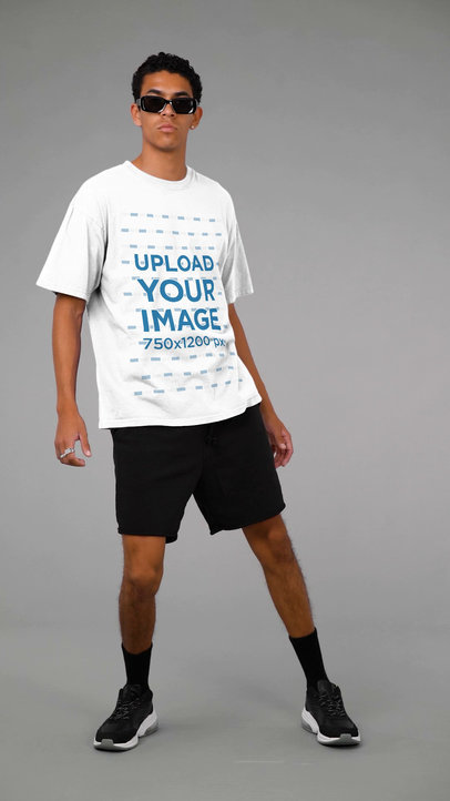 T-Shirt Video Featuring a Cool Man With Sunglasses at a Studio