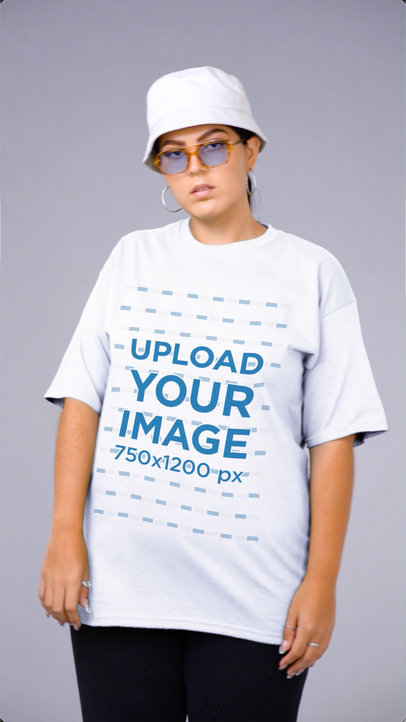 Round-Neck T-Shirt Video Featuring a Woman Posing and Jumping at a Studio