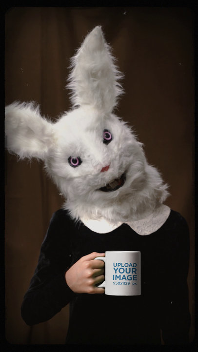 Vintage Creep Video of a Girl With a Scary Bunny Mask Holding a Mug