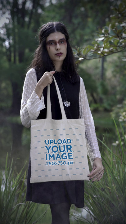 Wicca-Themed Video Featuring a Woman Carrying a Tote Bag in a Forest
