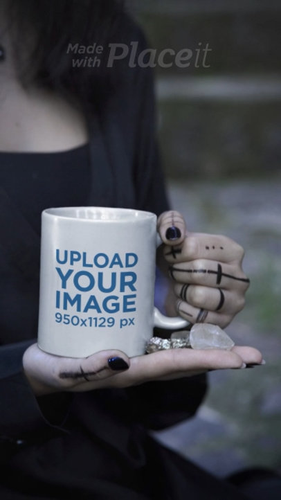 Video of an 11 Oz Mug Featuring a Woman Posing in a Wicca-Themed Setting