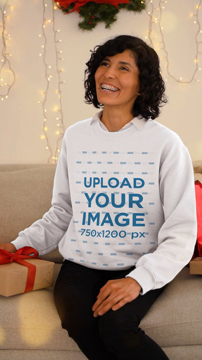 Christmas-Themed Video Featuring a Happy Woman Wearing a Sweatshirt