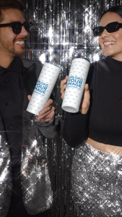 Skinny Tumbler Video Featuring a Joyful Man and Woman Celebrating New Year's Day