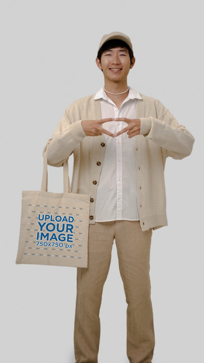 Tote Bag Video Featuring a Smiling Man and a Kawaii Theme