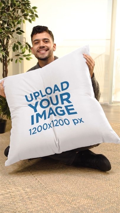 Video of a Smiling Man Holding a Sublimated Floor Pillow 6355v