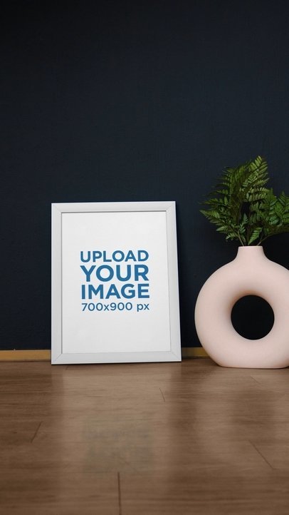 Video of Two Art Prints Placed Next to a Plant