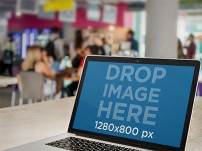 Macbook Mockup Template at a Crowded Cafeteria a4640