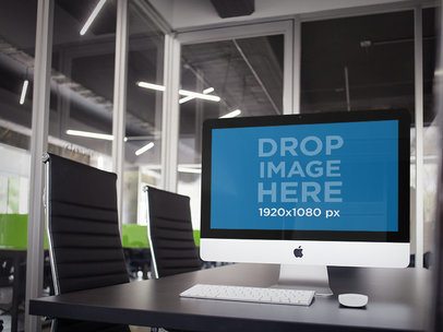 Mockup of an iMac at an Office Conference Room
