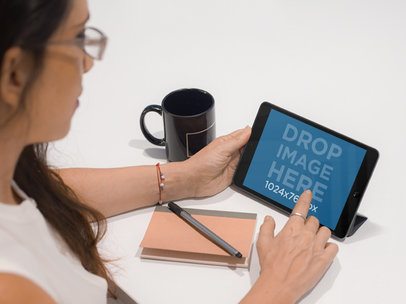 Tablet Mockup Featuring a Businesswoman Working on an iPad a5465