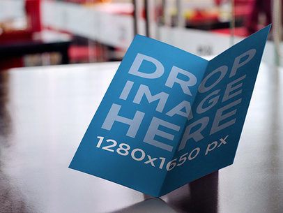 Brochure Mockup Featuring a Brochure Sitting on Top of a Table