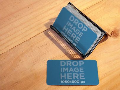 Business Cards Placed Over a Metal Business Cardholder Mockup a6298