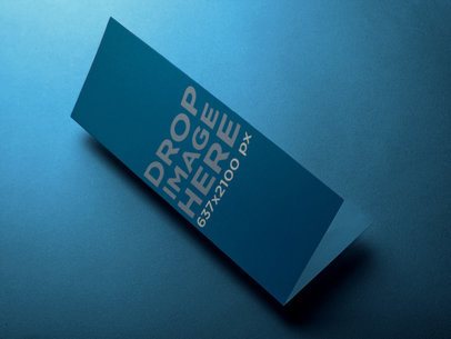 Mockup Featuring a Brochure Lying on Top of a Smooth Surface