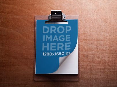 Mockup of a Clipboard Lying on Top of a Wooden Surface a6219