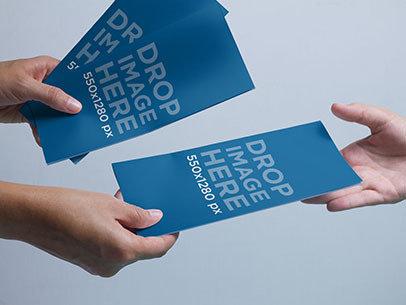 Brochure Mockup Featuring a Person Handing Out Brochures b6354