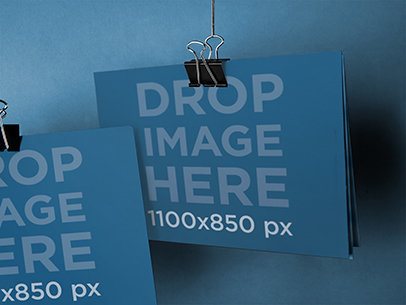 Brochure Mockup Template of Two Brochures Being Hung by Paper Clips