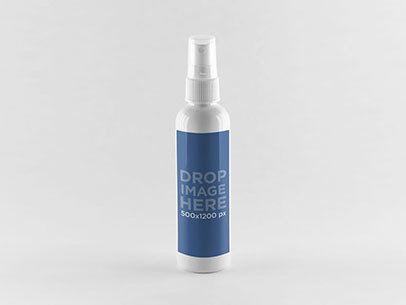 Label Mockup Featuring a Spray Bottle Standing Over a Flat Surface
