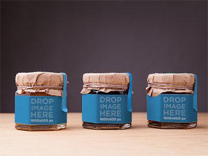 Label Mockup Featuring a Set of 3 Small Honey Jars