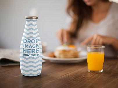 Label Mockup Featuring a Milk Bottle on Top of a Breakfast Table