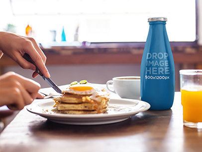 Label Mockup Featuring a Juice Bottle at a Breakfast Table