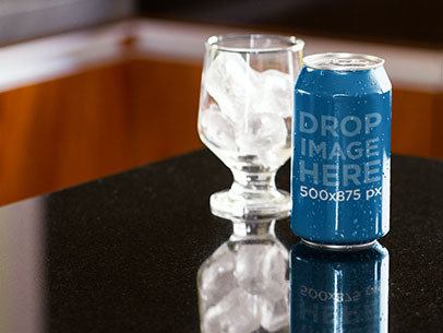 Mockup Featuring a Soda Can Next to a Glass With Ice