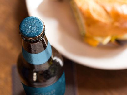 Mockup of a Beer Standing at a Restaurant Table